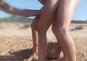 oral pleasure coupled with lovemaking on the beach, a stranger joins in