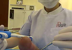 Play dental hygienist coupled with dentist